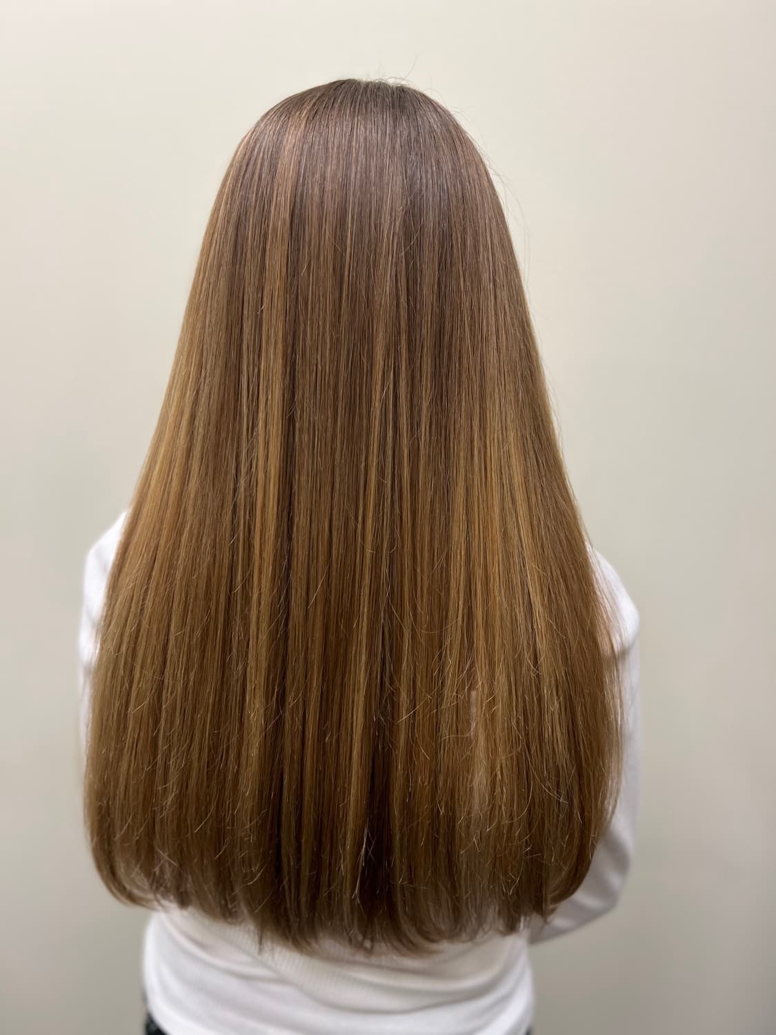 Long hair left smooth and glossy after a Brazilian blowout